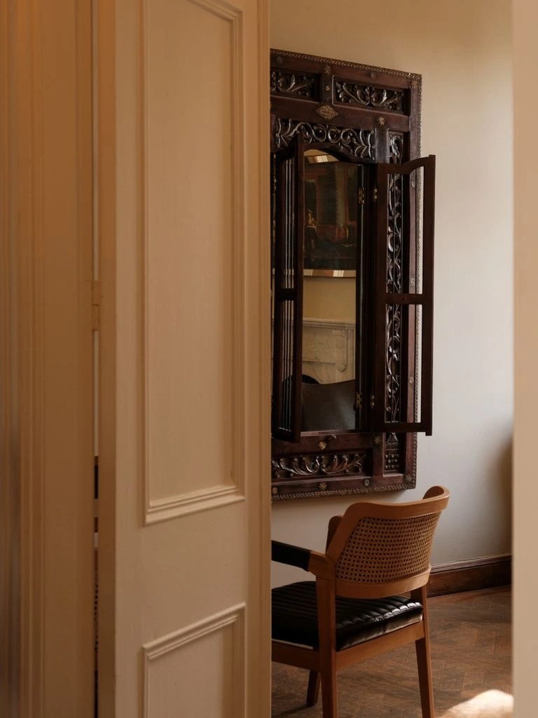 The Hamilton Room set with a long oval table for thirty-six guests